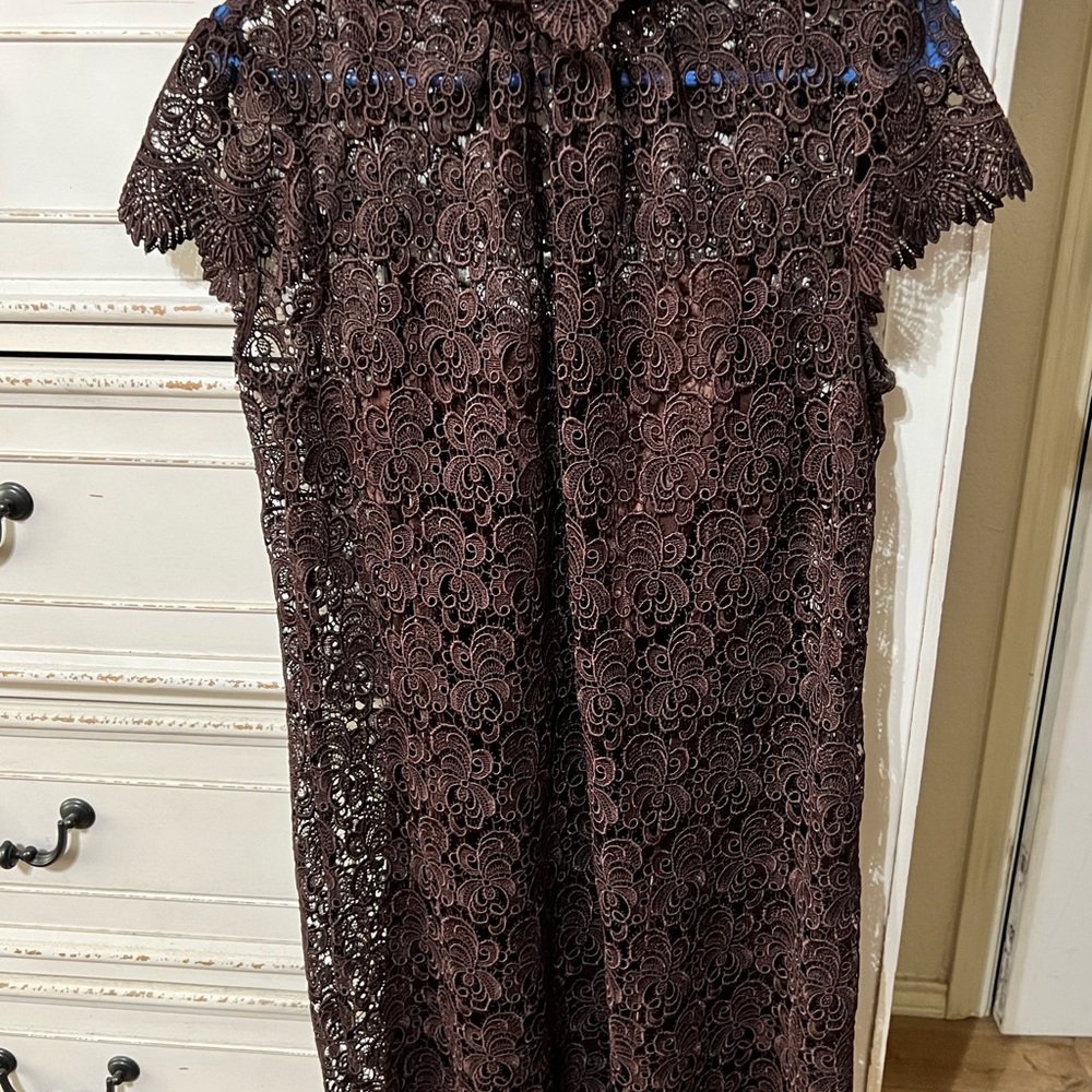 An Original Milly of New York chocolate brown lace cocktail dress.
